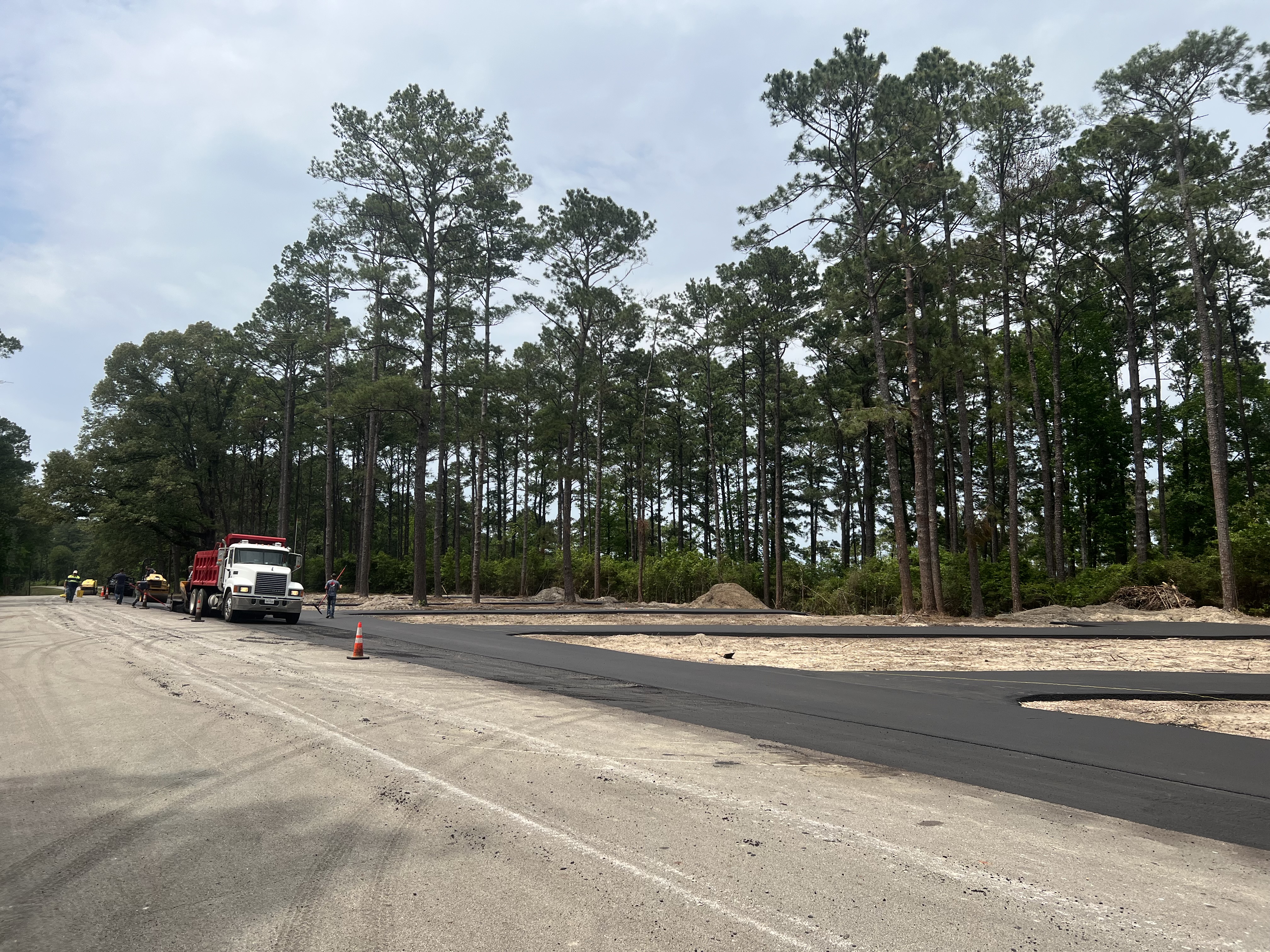 JBC Excavation's commercial asphalt services are showcased.